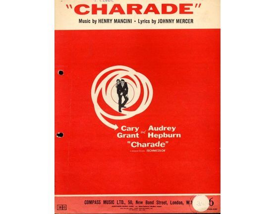 7256 | Charade - From "Charade" Cary Grant and Audrey Hepburn